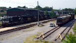 NS 3609 leads train 25A past the NS research and test train parked for the weekend